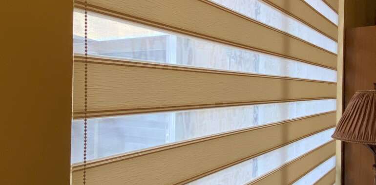 Add a touch of elegance to your home decor with roller shades in Delray Beach